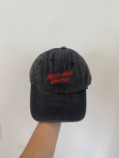 Milly and wolf merch cap